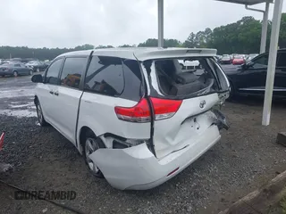 2014 Toyota Sienna L with VIN 5TDZK3DC9ES473780, listed as a IAAI auction lot 42245274 with 203,060 mi miles and . Bid and sale history available at DreamBid. Image 3.