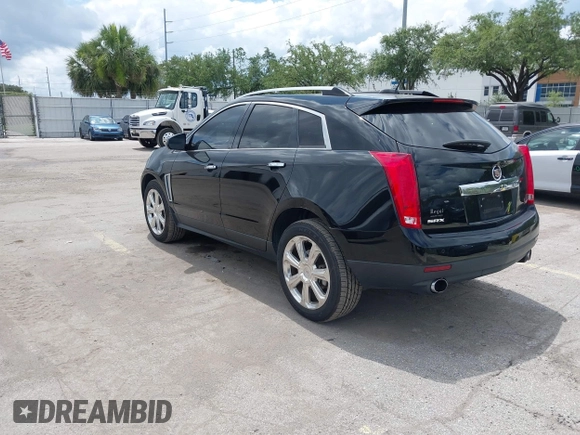 2015 Cadillac SRX Performance Collection z VIN 3GYFNCE31FS597798, wystawiony jako IAAI lot #42387793 z przebiegiem 159 986 mil mil oraz . Historia ofert i sprzedaży dostępna na DreamBid. Obrazek 3.