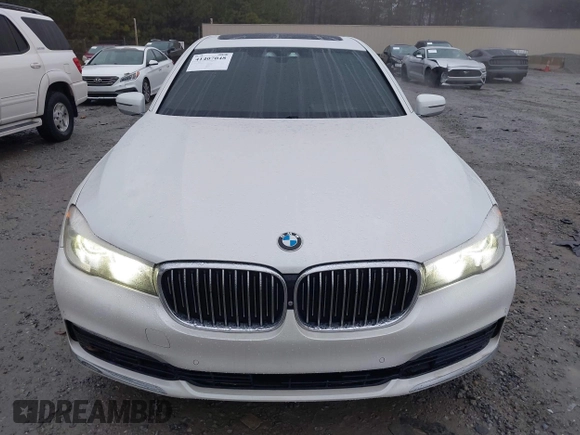 2017 BMW 7 Series 740i z VIN WBA7E2C51HG740000, wystawiony jako IAAI lot #41407048 z przebiegiem 114 929 mil mil oraz . Historia ofert i sprzedaży dostępna na DreamBid. Obrazek 12.