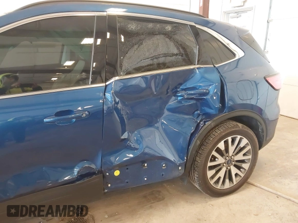 2022 Ford Escape Titanium Hybrid z VIN 1FMCU9DZ9NUA38627, wystawiony jako IAAI lot #42288647 z przebiegiem 54 802 mil mil oraz . Historia ofert i sprzedaży dostępna na DreamBid. Obrazek 6.