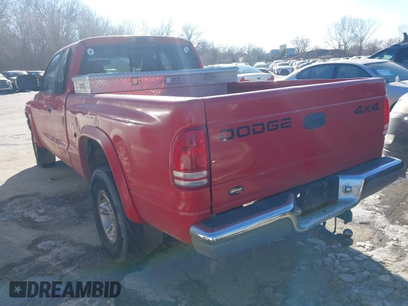 1999 Dodge Dakota SLT with VIN 1B7GG22Y3XS289253, listed as a IAAI auction lot 41283728 with 154,038 mi miles and . Bid and sale history available at carsss.com. Image 3.
