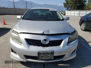 2010 Toyota Corolla with VIN 1NXBU4EE8AZ230173, listed as a Copart auction lot 55180085 with 168,682 mi miles and Clean Title. Bid and sale history available at DreamBid. Image 5.