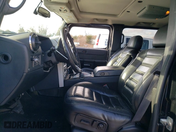 2005 Hummer H2 SUV with VIN 5GRGN23U35H111403, listed as a Copart auction lot 84720994 with 142,159 mi miles and Salvage Title. Bid and sale history available at carsss.com. Image 7.