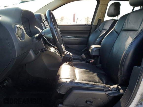2017 Jeep Compass High Altitude with VIN 1C4NJCEB1HD199112, listed as a Copart auction lot 55627155 with 184,536 mi miles and Salvage title. Bid and sale history available at DreamBid. Image 7.