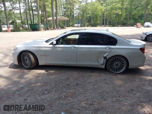 2013 BMW 7 Series 750Li with VIN WBAYE8C55DDS16013, listed as a IAAI auction lot 42709519 with 123,405 mi miles and . Bid and sale history available at DreamBid. Image 14.