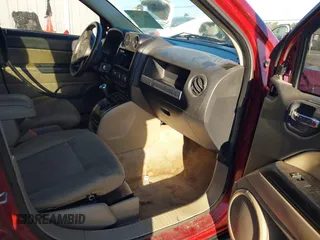 2015 Jeep Compass Sport with VIN 1C4NJCBB3FD297186, listed as a IAAI auction lot 41874776 with 234,744 mi miles. Bid and sale history available at carsss.com. Image 5.