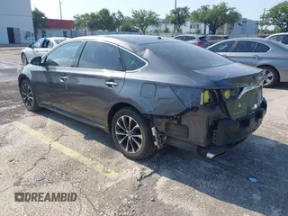 2016 Toyota Avalon Limited z VIN 4T1BK1EB6GU194843, wystawiony jako IAAI lot #42274532 z przebiegiem 100 759 mil mil oraz . Historia ofert i sprzedaży dostępna na DreamBid. Obrazek 3.