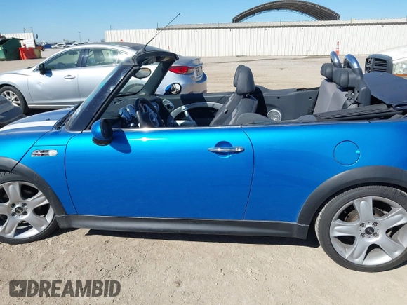 2007 MINI Convertible S with VIN WMWRH33547TL94374, listed as a IAAI auction lot 40910780 with 45,162 mi miles and . Bid and sale history available at DreamBid. Image 14.