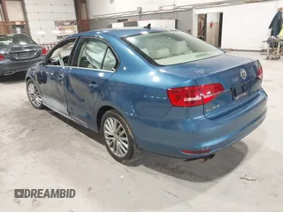 2015 Volkswagen Jetta SE z VIN 3VWD07AJ2FM315225, wystawiony jako IAAI lot #41929278 z przebiegiem 127 240 mil mil oraz . Historia ofert i sprzedaży dostępna na DreamBid. Obrazek 3.