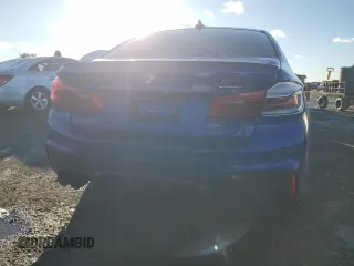 2019 BMW M5 with VIN WBSJF0C5XKB285493, listed as a Copart auction lot 87696545 with 47,381 mi miles and Salvage Title. Bid and sale history available at carsss.com. Image 6.