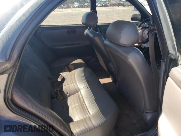 1996 Lexus ES 300 z VIN JT8BF12G5T0163320, wystawiony jako Copart lot #50125035 z przebiegiem 209 592 mil mil oraz Szkoda całkowita • Salvage title. Historia ofert i sprzedaży dostępna na DreamBid. Obrazek 11.