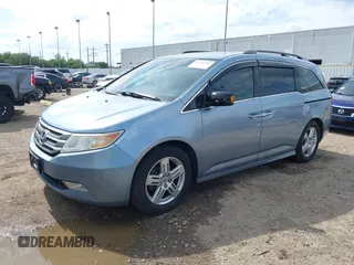2011 Honda Odyssey Touring с VIN 5FNRL5H92BB033245, выставлен на аукционе IAAI как лот 42226287 с пробегом 184 910 миль миль и . История ставок и продаж доступна на DreamBid. Изображение 18.