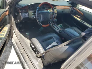 2002 Cadillac Eldorado Touring ETC z VIN 1G6ET12902B105467, wystawiony jako Copart lot #57694675 z przebiegiem Nie podano mil oraz Szkody całkowita. Historia ofert i sprzedaży dostępna na DreamBid. Obrazek 8.