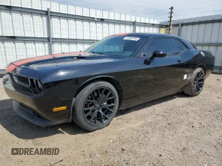 2013 Dodge Challenger SXT z VIN 2C3CDYAG0DH540711, wystawiony jako Copart lot #53969765 z przebiegiem 209 471 mil mil oraz Szkoda całkowita • Salvage title. Historia ofert i sprzedaży dostępna na DreamBid. Obrazek 1.