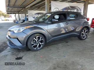 2018 Toyota C-HR XLE with VIN NMTKHMBXXJR025925, listed as a Copart auction lot 60121105 with 107,081 mi miles and Salvage title. Bid and sale history available at DreamBid. Image 1.