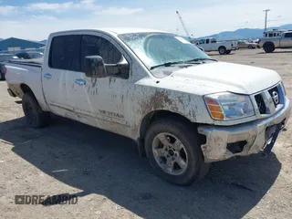 2007 Nissan Titan LE with VIN 1N6AA07B27N214751, listed as a IAAI auction lot 42325152 with 174,765 mi miles and . Bid and sale history available at DreamBid. Image 1.