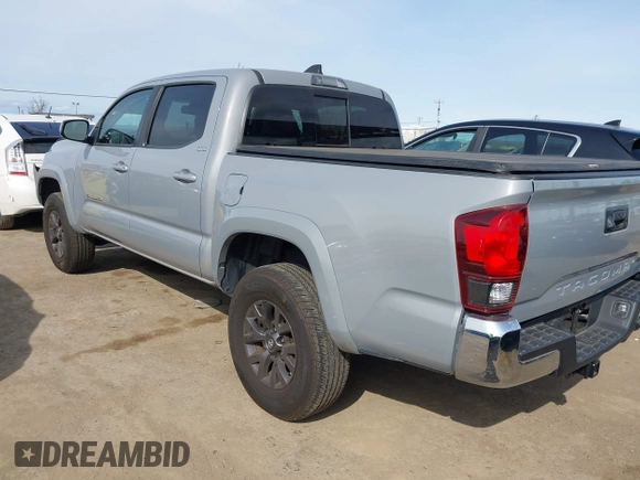 2020 Toyota Tacoma SR5 with VIN 5TFAZ5CN6LX089275, listed as a IAAI auction lot 41987526 with 51,661 mi miles and . Bid and sale history available at DreamBid. Image 3.