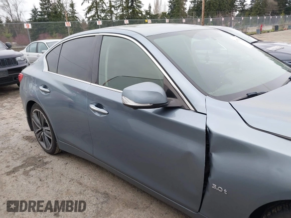 2017 Infiniti Q50 Premium z VIN JN1EV7AP1HM743432, wystawiony jako IAAI lot #41777874 z przebiegiem 94 354 mil mil oraz . Historia ofert i sprzedaży dostępna na DreamBid. Obrazek 13.