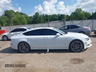 2016 Audi A7 Premium Plus with VIN WAUWGAFC2GN021696, listed as a IAAI auction lot 42595234 with 112,464 mi miles and . Bid and sale history available at DreamBid. Image 13.