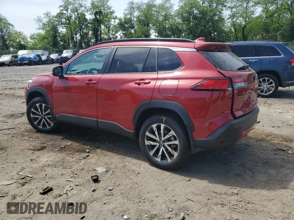 2022 Toyota Corolla Cross XLE with VIN 7MUDAABG5NV005882, listed as a Copart auction lot 56690265 with 6,427 mi miles and Salvage title. Bid and sale history available at DreamBid. Image 2.