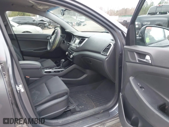 2016 Hyundai Tucson Sport with VIN KM8J33A21GU254828, listed as a IAAI auction lot 41297692 with 134,394 mi miles. Bid and sale history available at carsss.com. Image 5.