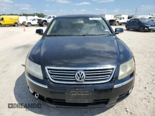 2005 Volkswagen Phaeton z VIN WVWAF03D658003589, wystawiony jako Copart lot #74049134 z przebiegiem 124 506 mil mil oraz Tytuł czysty. Historia ofert i sprzedaży dostępna na DreamBid. Obrazek 5.