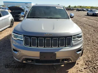 2018 Jeep Grand Cherokee Overland with VIN 1C4RJFCG8JC418368, listed as a Copart auction lot 50014005 with 34,287 mi miles and Salvage Title. Bid and sale history available at carsss.com. Image 5.