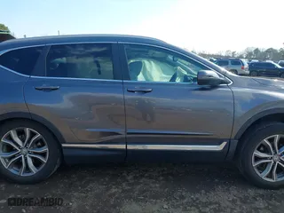 2021 Honda CR-V Touring with VIN 2HKRW2H9XMH645901, listed as a IAAI auction lot 41870446 with 22,996 mi miles. Bid and sale history available at carsss.com. Image 14.