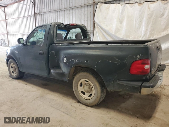 2003 Ford F-150 XL with VIN 1FTRF07223KB96495, listed as a Copart auction lot 63028535 with 217,315 mi miles and Clean title. Bid and sale history available at DreamBid. Image 2.