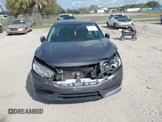2017 Honda Civic LX with VIN 19XFC2F51HE036153, listed as a IAAI auction lot 41546498 with 78,726 mi miles and . Bid and sale history available at DreamBid. Image 17.