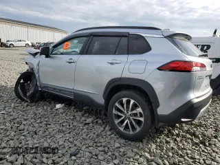 2023 Toyota Corolla Cross XLE with VIN 7MUDAABG6PV078570, listed as a Copart auction lot 65246535 with 21,928 mi miles and Salvage title. Bid and sale history available at DreamBid. Image 2.