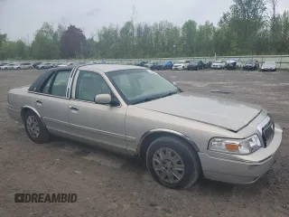 2006 Mercury Grand Marquis GS z VIN 2MEFM74W76X612565, wystawiony jako Copart lot #57940505 z przebiegiem 87 690 mil mil oraz Tytuł czysty. Historia ofert i sprzedaży dostępna na DreamBid. Obrazek 4.