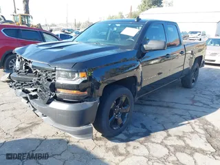 2018 Chevrolet Silverado 1500 Work Truck with VIN 1GCVKNEH3JZ247828, listed as a IAAI auction lot 41537573 with 134,684 mi miles. Bid and sale history available at carsss.com. Image 2.