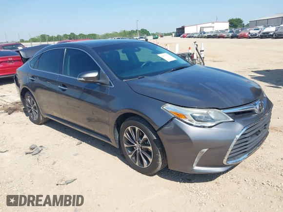 2018 Toyota Avalon XLE with VIN 4T1BK1EB1JU285770, listed as a IAAI auction lot 42073553 with 71,809 mi miles and . Bid and sale history available at DreamBid. Image 1.