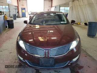 2015 Lincoln MKZ z VIN 3LN6L2J96FR600052, wystawiony jako Copart lot #56194715 z przebiegiem 259 911 mil mil oraz Szkoda całkowita • Salvage title. Historia ofert i sprzedaży dostępna na DreamBid. Obrazek 5.