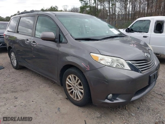 2012 Toyota Sienna XLE AAS with VIN 5TDYK3DC2CS276118, listed as a IAAI auction lot 41834422 with 143,043 mi miles. Bid and sale history available at carsss.com. Image 1.