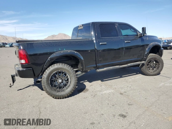 2014 Ram 2500 SLT with VIN 3C6UR5DL5EG145439, listed as a Copart auction lot 76088814 with 111,327 mi miles and Salvage title. Bid and sale history available at DreamBid. Image 3.