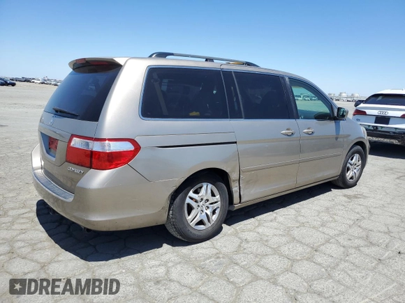 2005 Honda Odyssey EX-L with VIN 5FNRL38625B045152, listed as a Copart auction lot 57633005 with 145,776 mi miles and Salvage title. Bid and sale history available at DreamBid. Image 3.