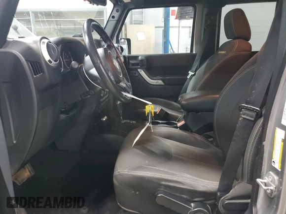 2015 Jeep Wrangler Unlimited Sahara with VIN 1C4BJWEG5FL743663, listed as a Copart auction lot 60205225 with 69,922 mi miles and Salvage title. Bid and sale history available at DreamBid. Image 7.