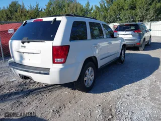 2009 Jeep Grand Cherokee Limited with VIN 1J8HR58P89C513900, listed as a IAAI auction lot 41615957 with 152,119 mi miles. Bid and sale history available at carsss.com. Image 4.
