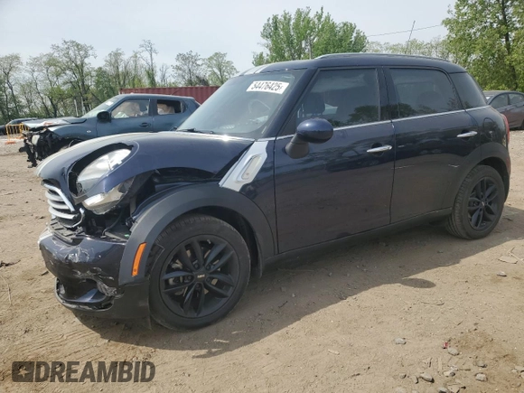 2014 MINI Countryman z VIN WMWZB3C55EWR42069, wystawiony jako Copart lot #54476425 z przebiegiem 42 218 mil mil oraz Szkoda całkowita • Salvage title. Historia ofert i sprzedaży dostępna na DreamBid. Obrazek 1.