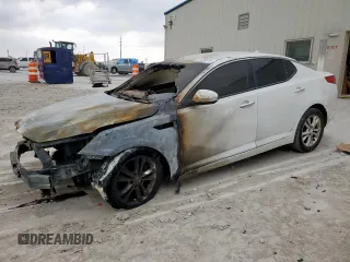 2013 Kia Optima LX z VIN 5XXGM4A70DG149356, wystawiony jako Copart lot #51630915 z przebiegiem Nie podano mil oraz Szkoda całkowita • Salvage title. Historia ofert i sprzedaży dostępna na DreamBid. Obrazek 1.