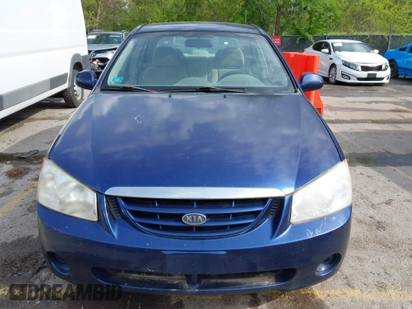 2006 Kia Spectra EX with VIN KNAFE122965293874, listed as a IAAI auction lot 42111219 with 241,644 mi miles. Bid and sale history available at carsss.com. Image 6.
