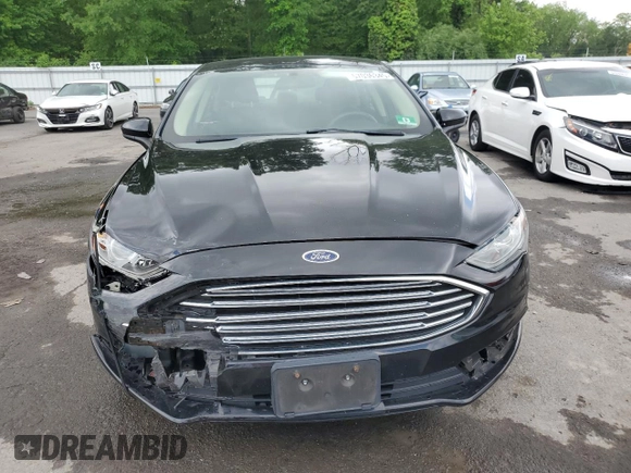 2018 Ford Fusion SE z VIN 3FA6P0LU8JR264630, wystawiony jako Copart lot #57036345 z przebiegiem 234 757 mil mil oraz Szkoda całkowita • Salvage title. Historia ofert i sprzedaży dostępna na DreamBid. Obrazek 5.
