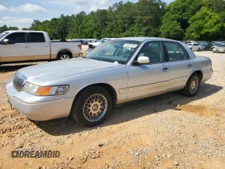2002 Mercury Grand Marquis GS z VIN 2MEFM74W82X659338, wystawiony jako Copart lot #53887785 z przebiegiem 155 266 mil mil oraz Szkoda całkowita • Salvage title. Historia ofert i sprzedaży dostępna na DreamBid. Obrazek 1.