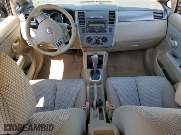 2009 Nissan Versa SL with VIN 3N1BC13E69L383863, listed as a Copart auction lot 59166235 with 138,630 mi miles and Salvage title. Bid and sale history available at DreamBid. Image 8.