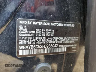 2015 BMW 7 Series 750i xDrive with VIN WBAYB6C53FD966042, listed as a Copart auction lot 69387464 with 64,977 mi miles and Salvage Title. Bid and sale history available at carsss.com. Image 14.