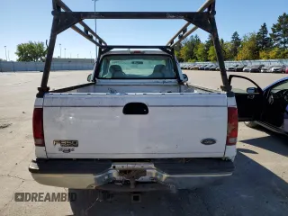 2002 Ford F-350 with VIN 1FTSF30S02EC49608, listed as a Copart auction lot 76176934 with 146,708 mi miles and Clean title. Bid and sale history available at DreamBid. Image 6.