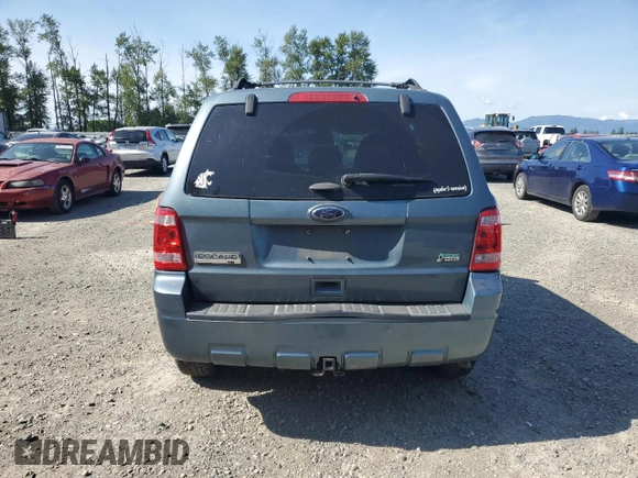2012 Ford Escape XLT z VIN 1FMCU9DG1CKC54737, wystawiony jako Copart lot #59902055 z przebiegiem 206 067 mil mil oraz Szkoda całkowita • Salvage title. Historia ofert i sprzedaży dostępna na DreamBid. Obrazek 6.