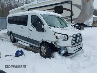 2018 Ford Transit Wagon XL with VIN 1FBZX2ZG2JKB04207, listed as a IAAI auction lot 41440996 with 126,256 mi miles. Bid and sale history available at carsss.com. Image 1.